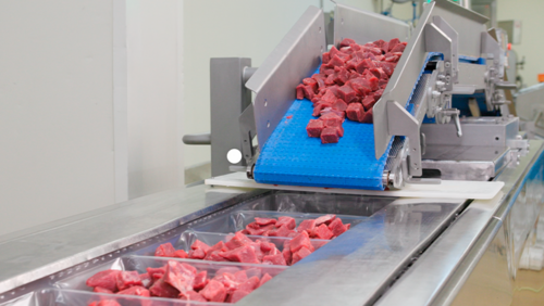 Portioning system for meat cubes