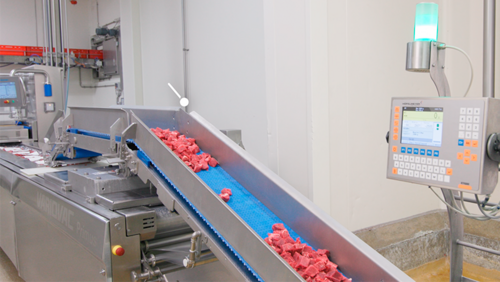 Portioning system for meat cubes