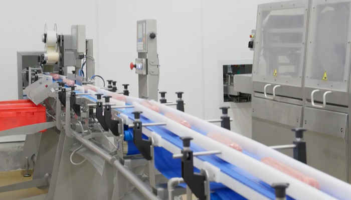  Automatic labelling line for minced meat sticks 